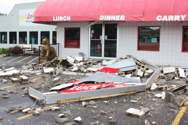 Winds Topple Restaurant Sign, Blocks